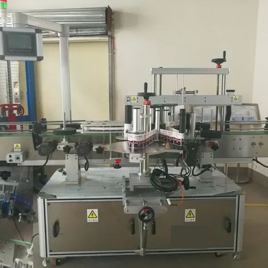 Máy dán nhãn chai vuông 1 mặt tự động